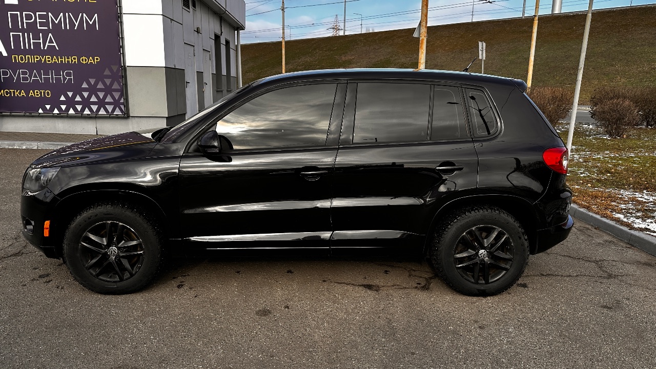 Volkswagen Tiguan - фото 11