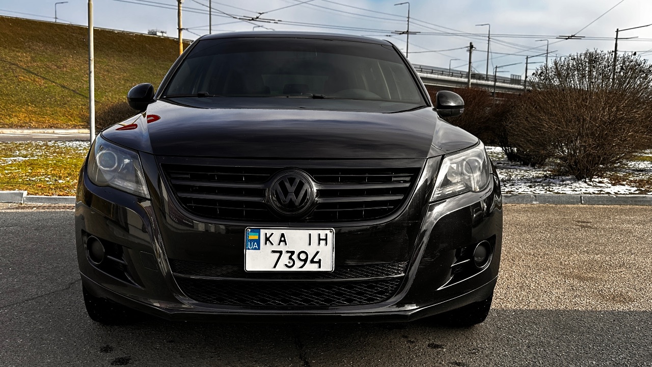 Volkswagen Tiguan - фото 1