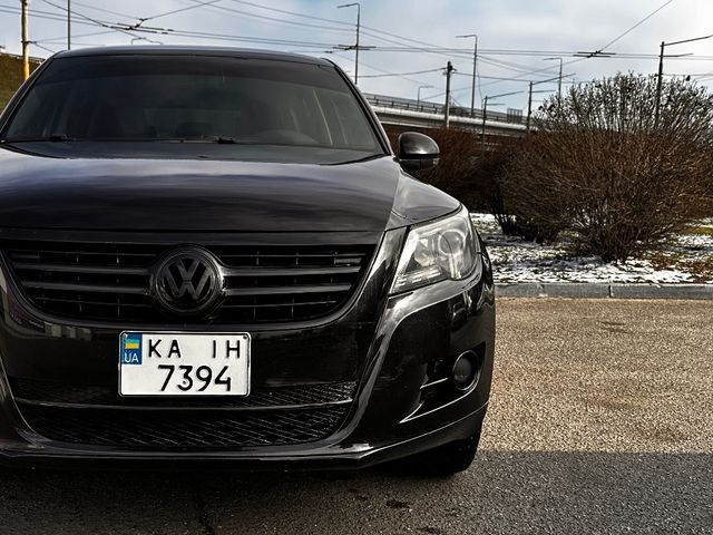 Volkswagen Tiguan - фото 1