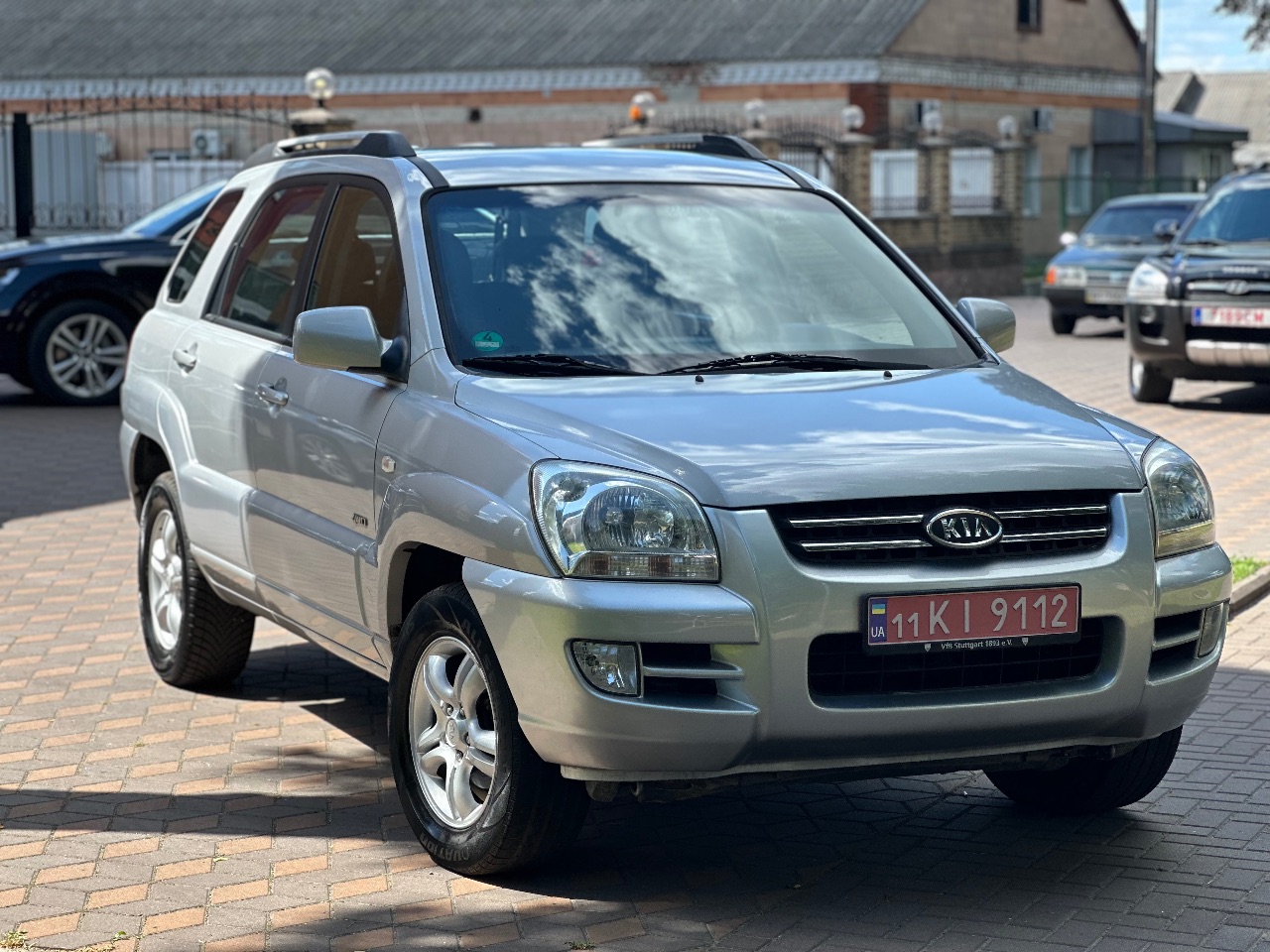 Kia Sportage - фото 1