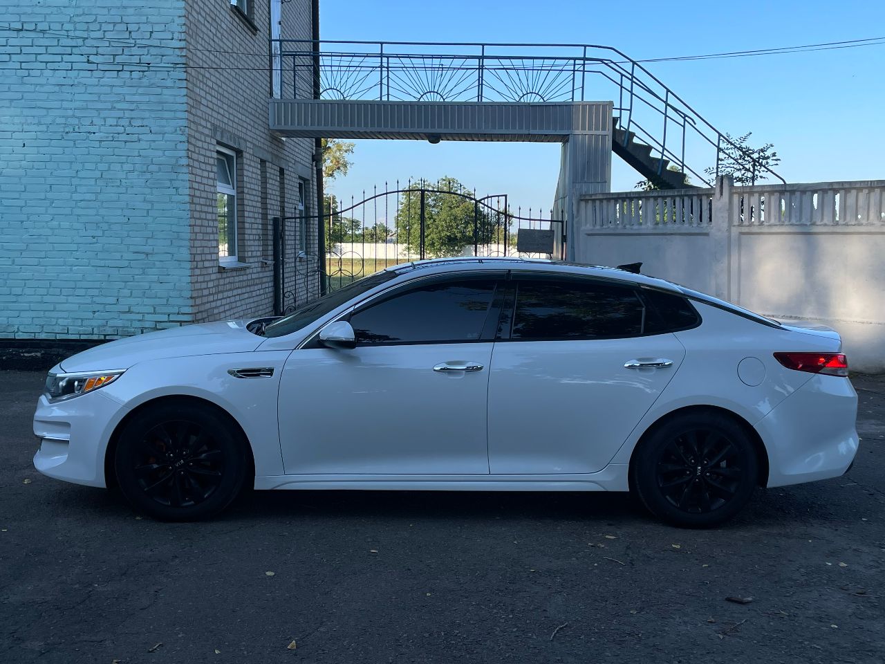 Kia Optima - фото 7