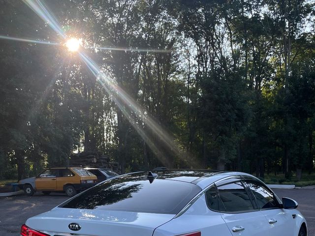 Kia Optima - фото 4