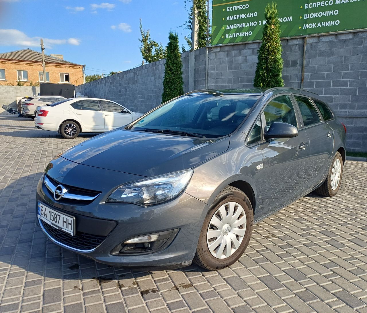 Opel Astra - фото 1
