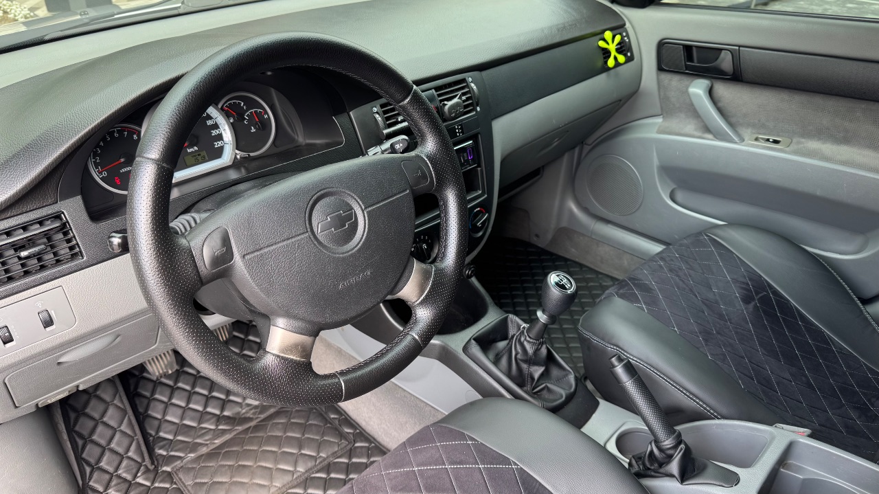 Chevrolet Lacetti - фото 13