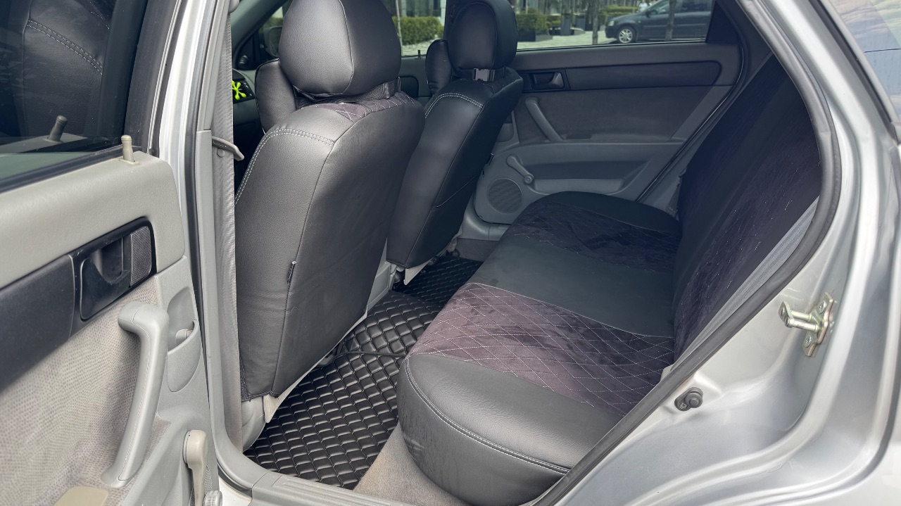 Chevrolet Lacetti - фото 14