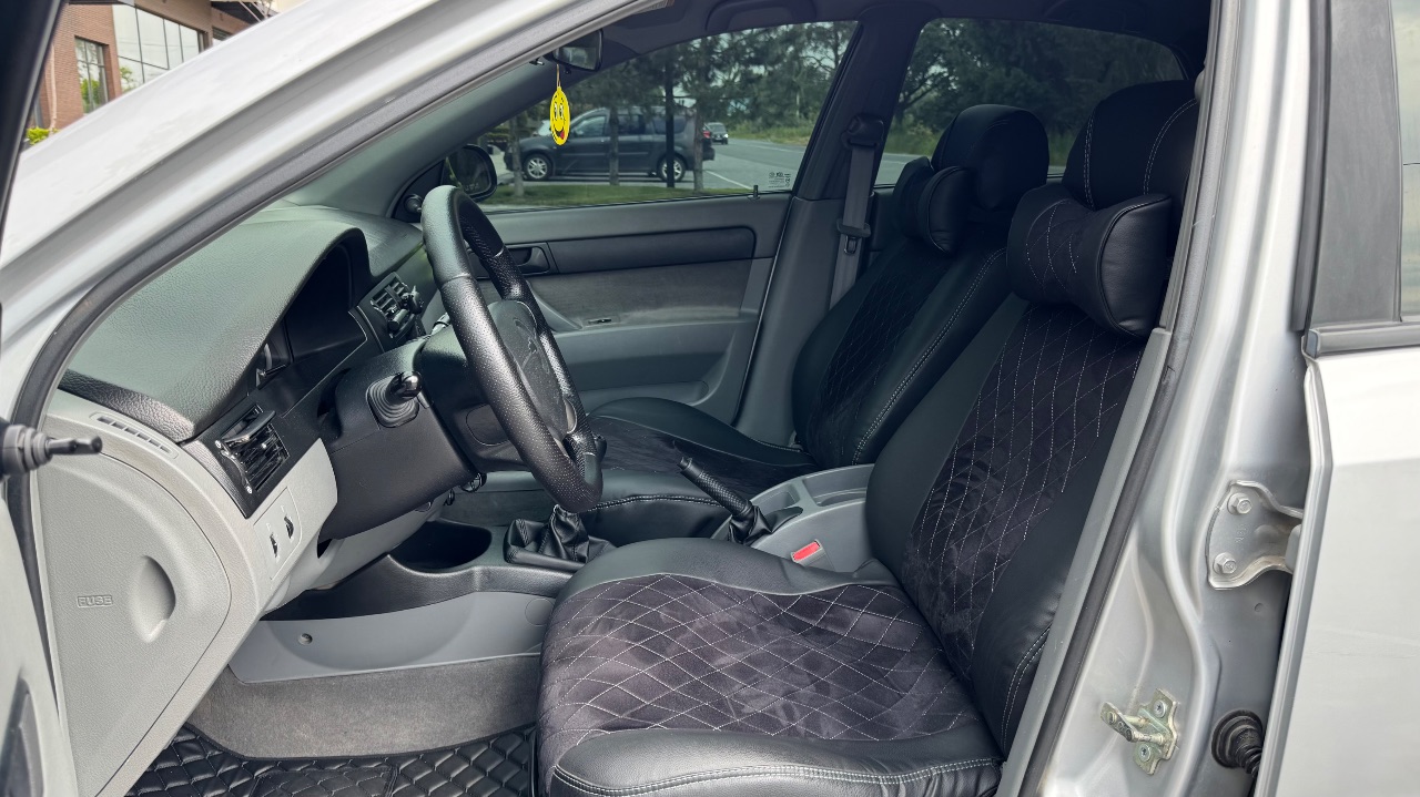 Chevrolet Lacetti - фото 12