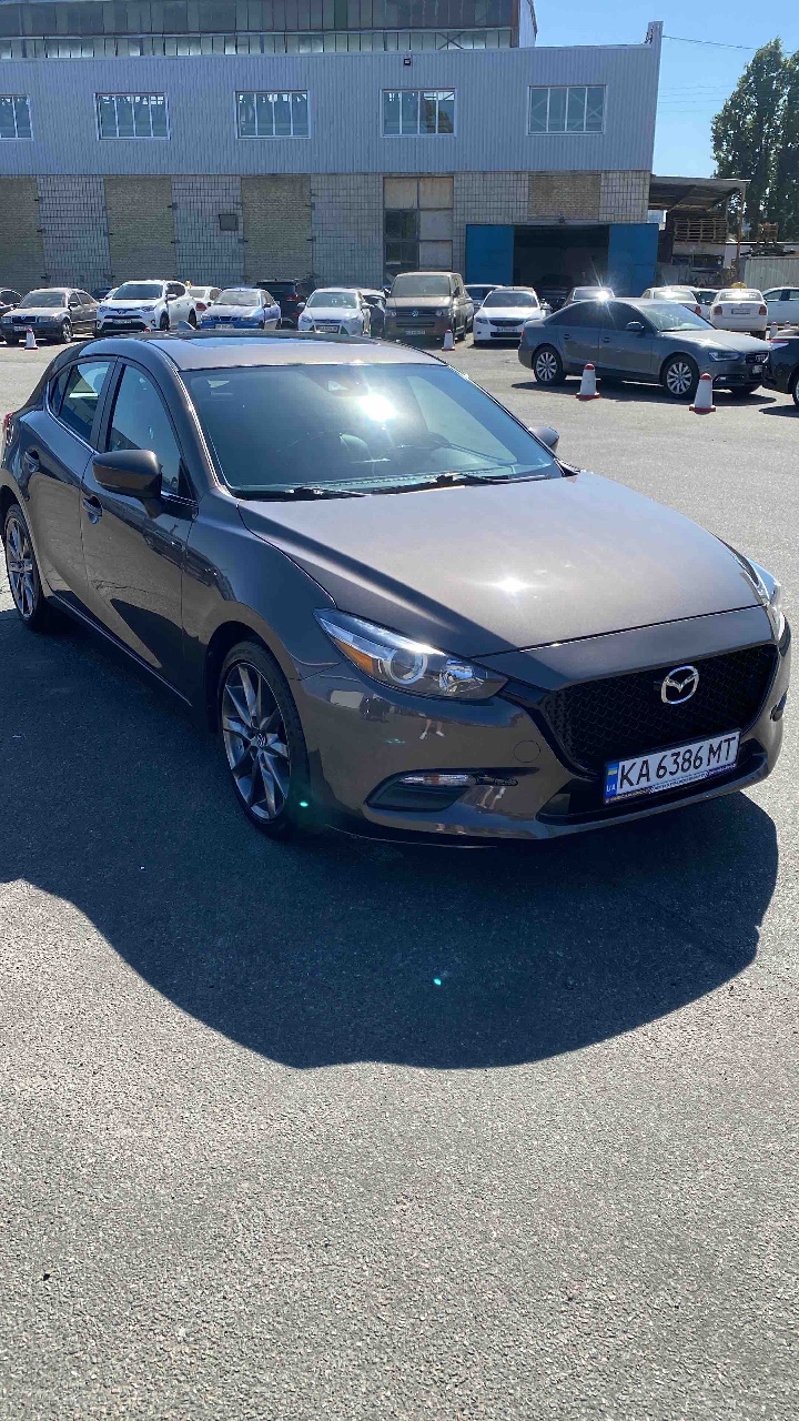 Mazda 3 - фото 2