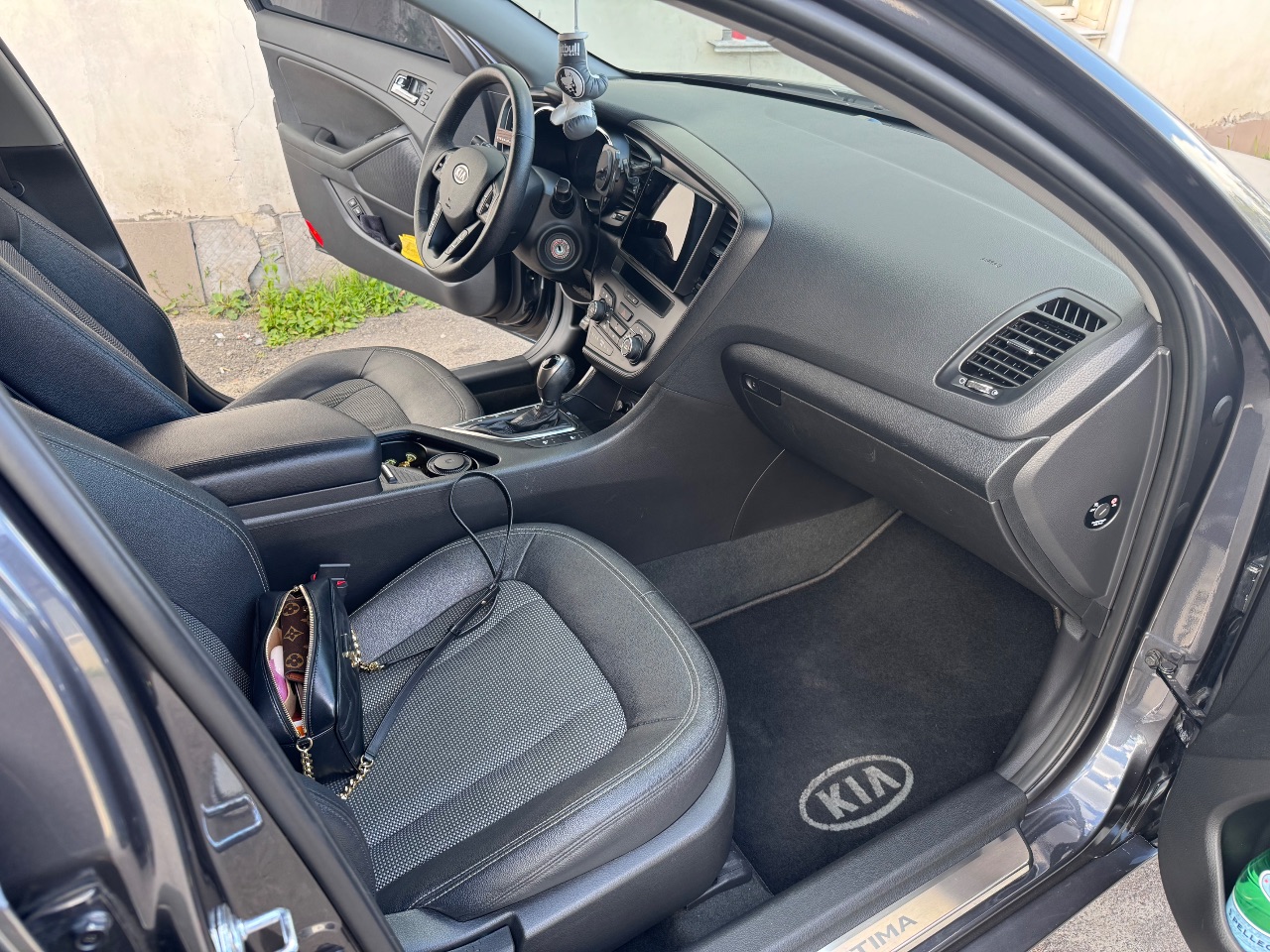 Kia Optima - фото 9