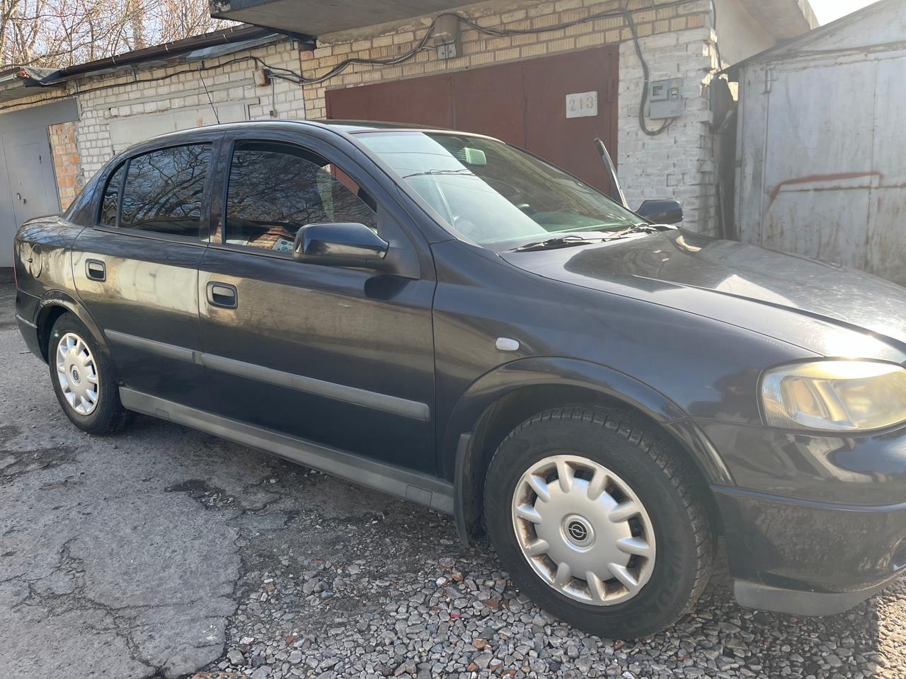 Opel Astra - фото 12