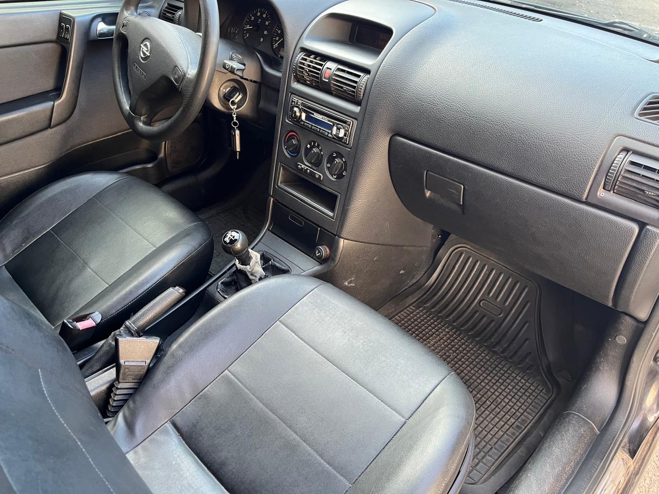 Opel Astra - фото 11