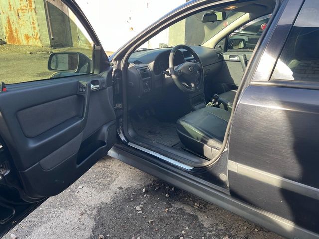 Opel Astra - фото 5