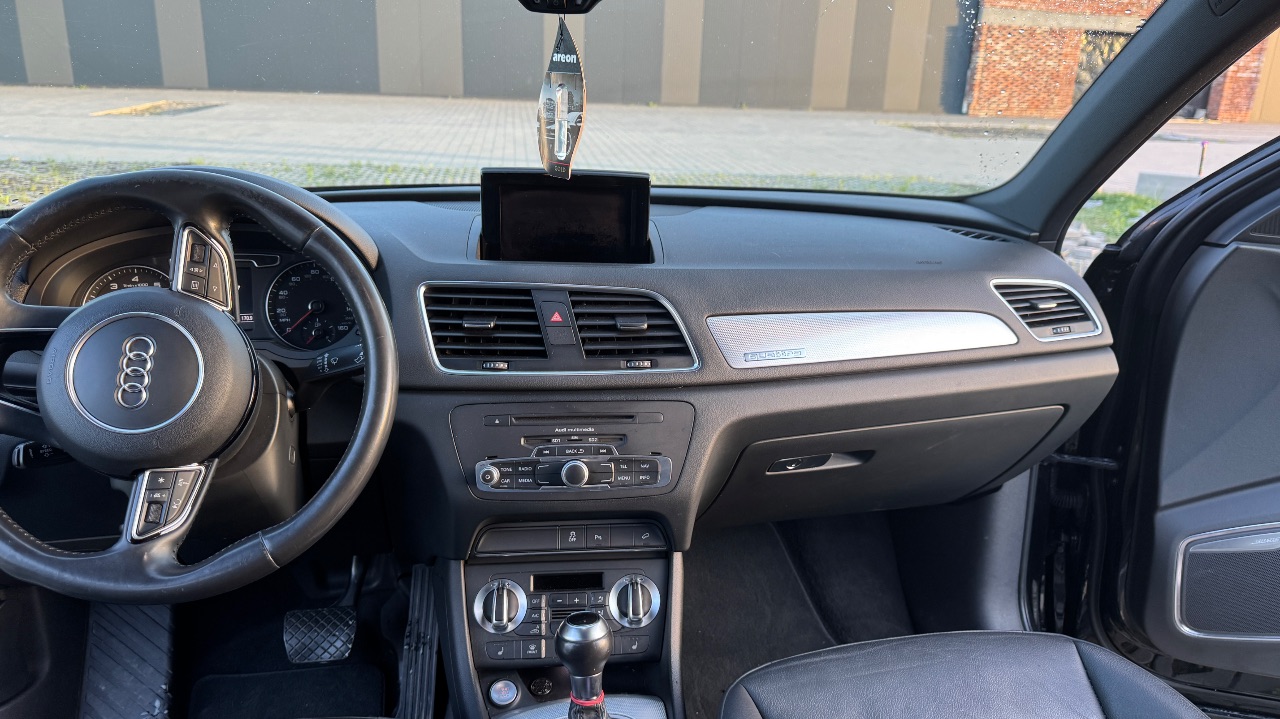 Audi Q3 - фото 8