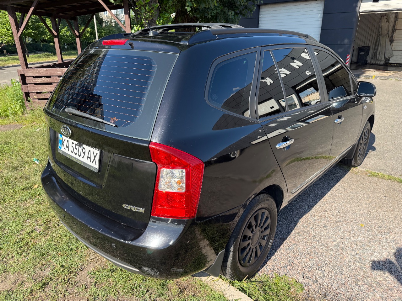 Kia Carens - фото 5