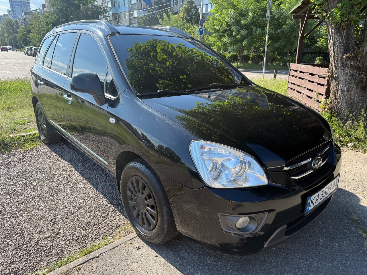 Kia Carens - фото 3