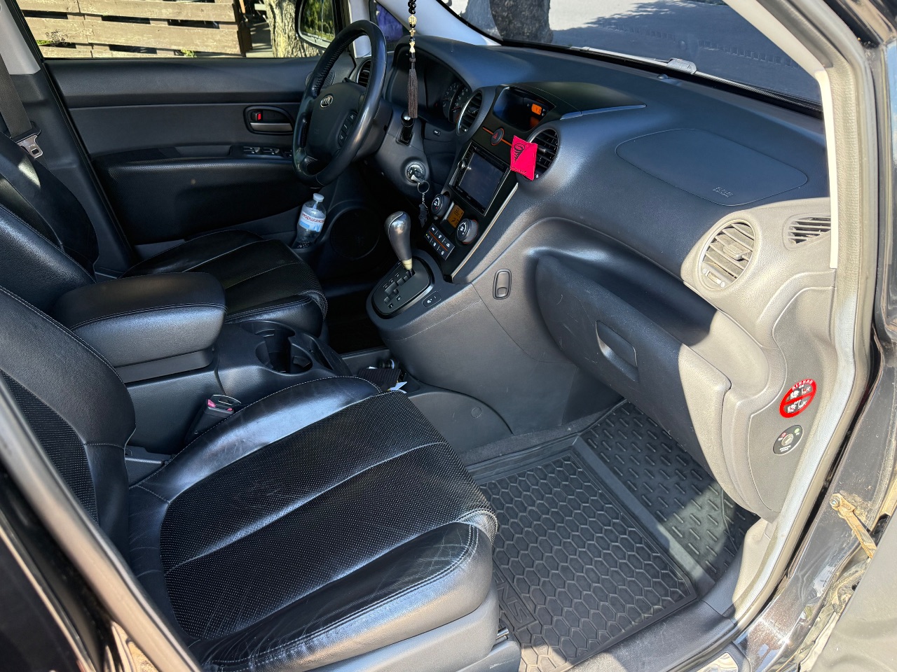 Kia Carens - фото 10