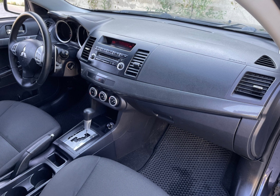 Mitsubishi Lancer - фото 9