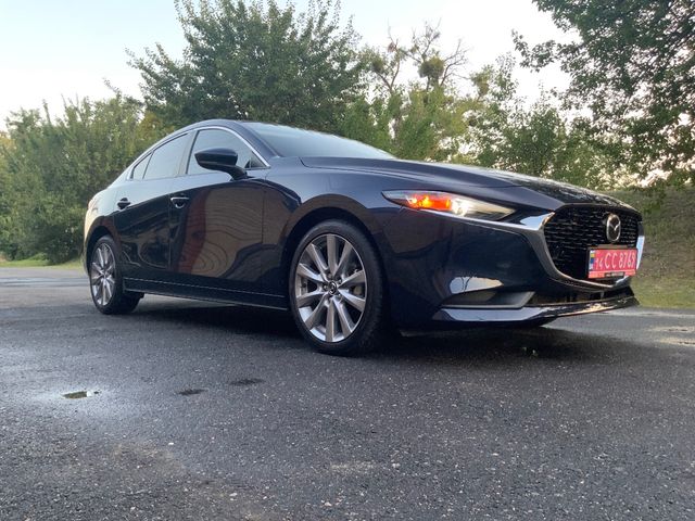 Mazda 3 - фото 4