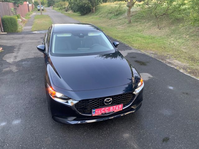 Mazda 3 - фото 2