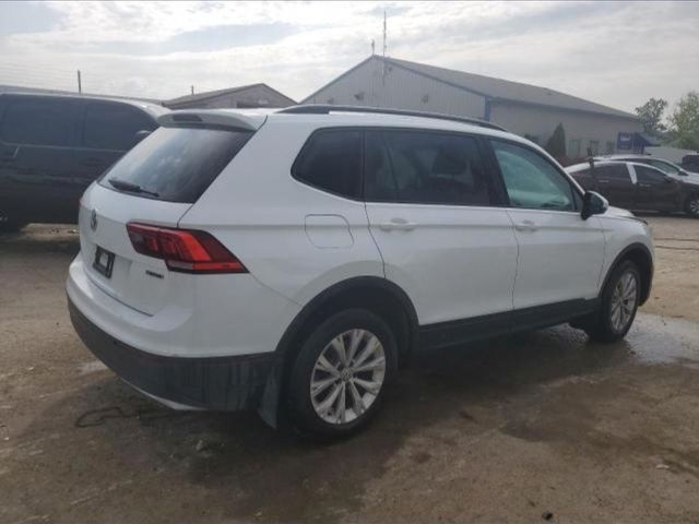 Volkswagen Tiguan - фото 2