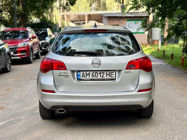 Opel Astra - фото 5