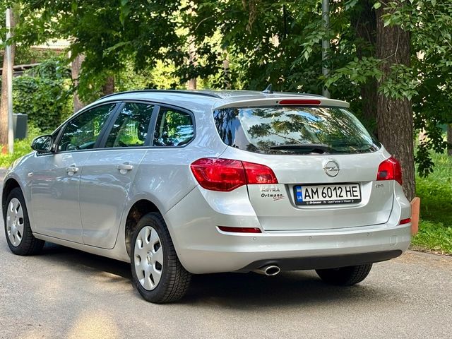 Opel Astra - фото 4