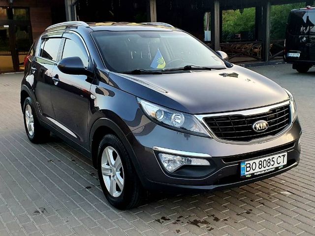 Kia Sportage - фото 1