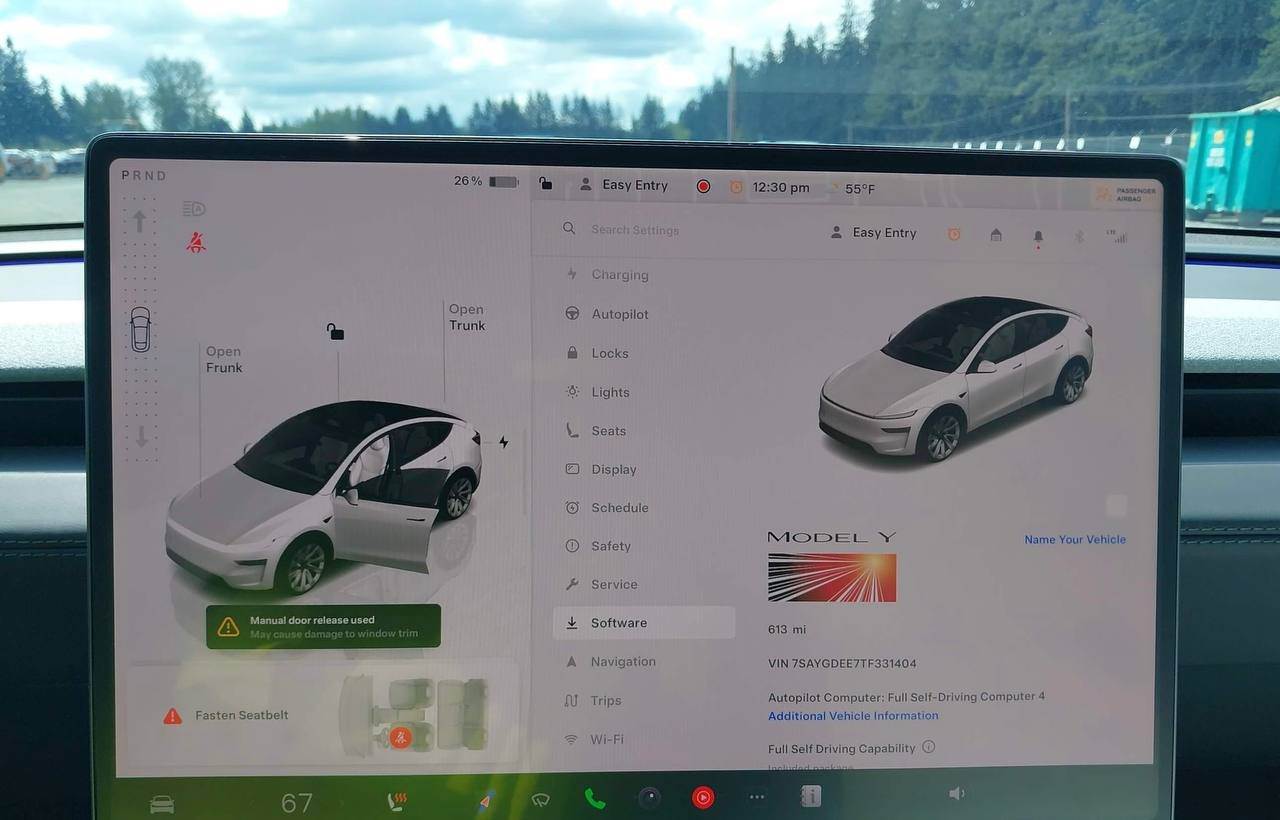 Tesla Model Y - фото 11