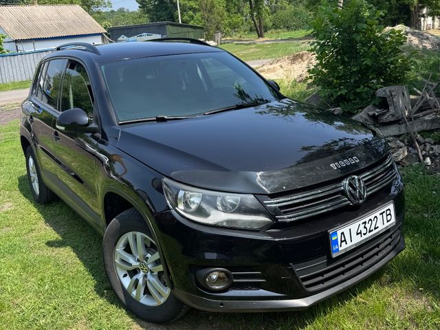 Volkswagen Tiguan - фото 1
