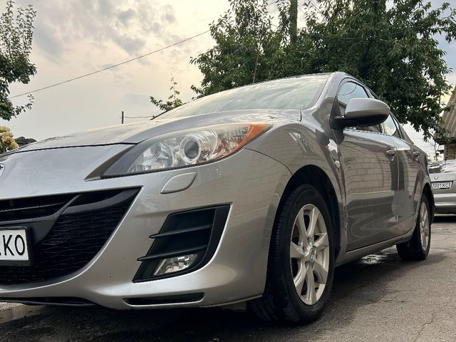 Mazda 3 - фото 4