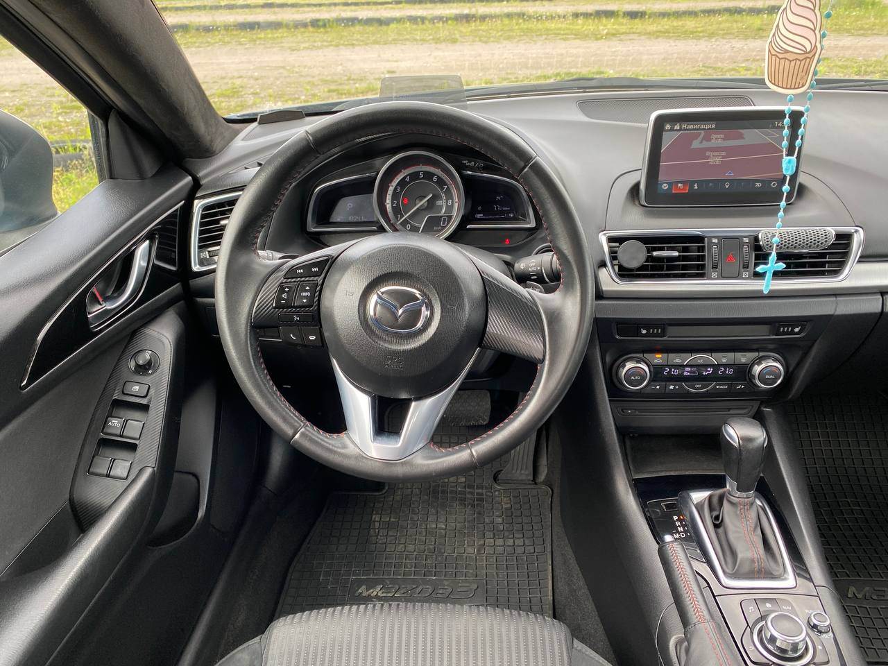 Mazda 3 - фото 11