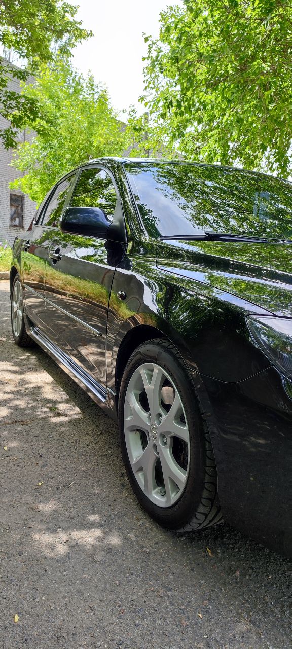 Mazda 3 - фото 6