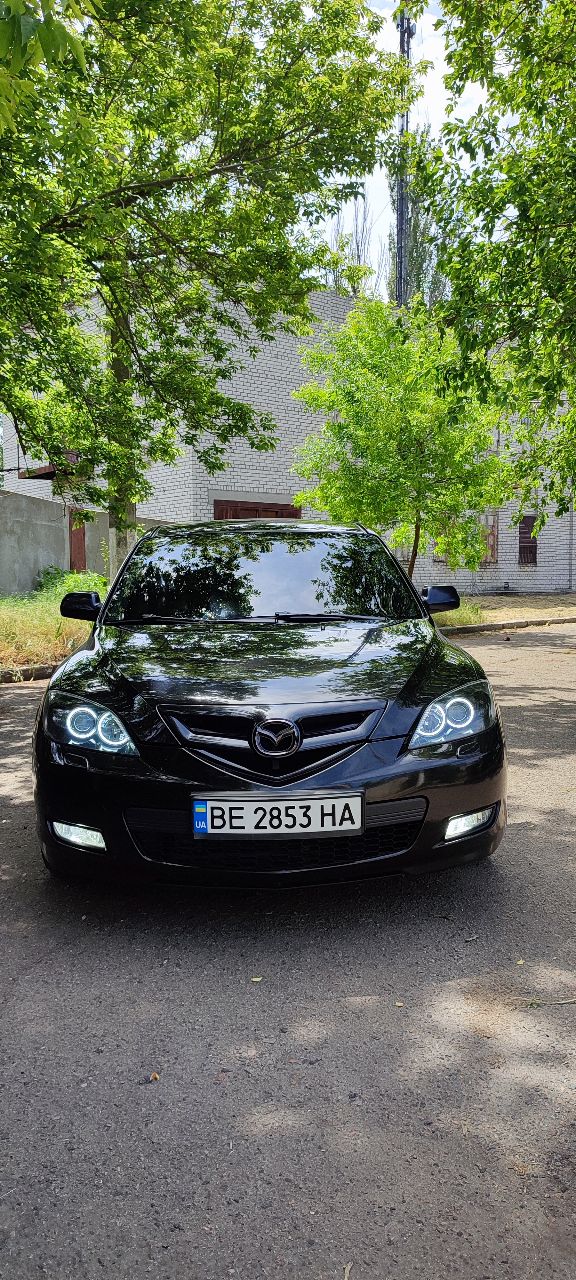 Mazda 3 - фото 5