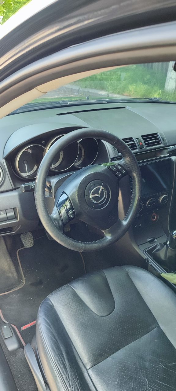 Mazda 3 - фото 2