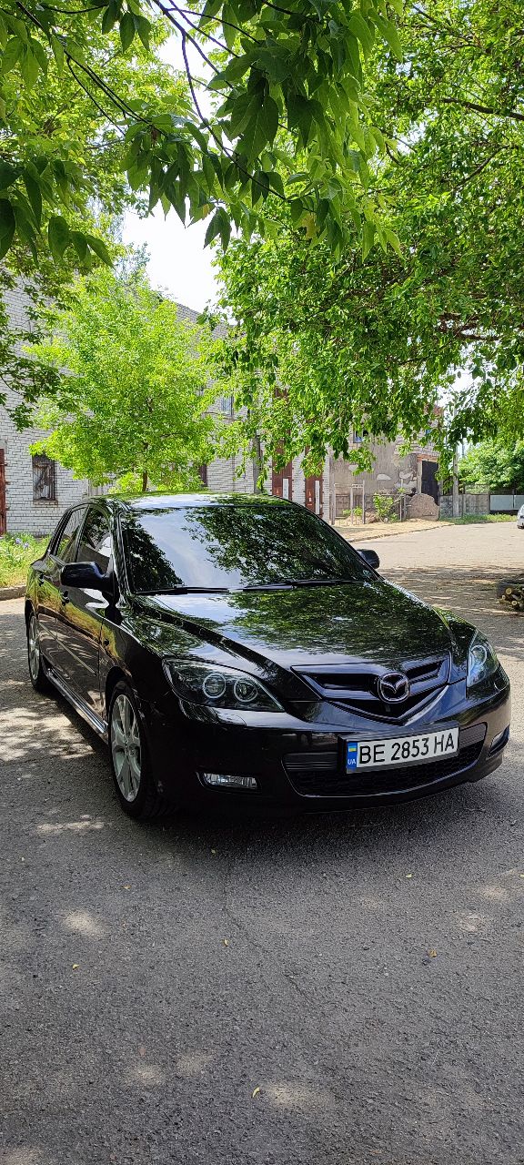 Mazda 3 - фото 7