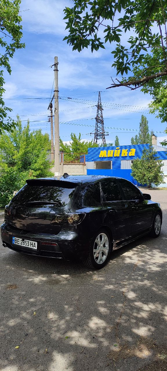 Mazda 3 - фото 8