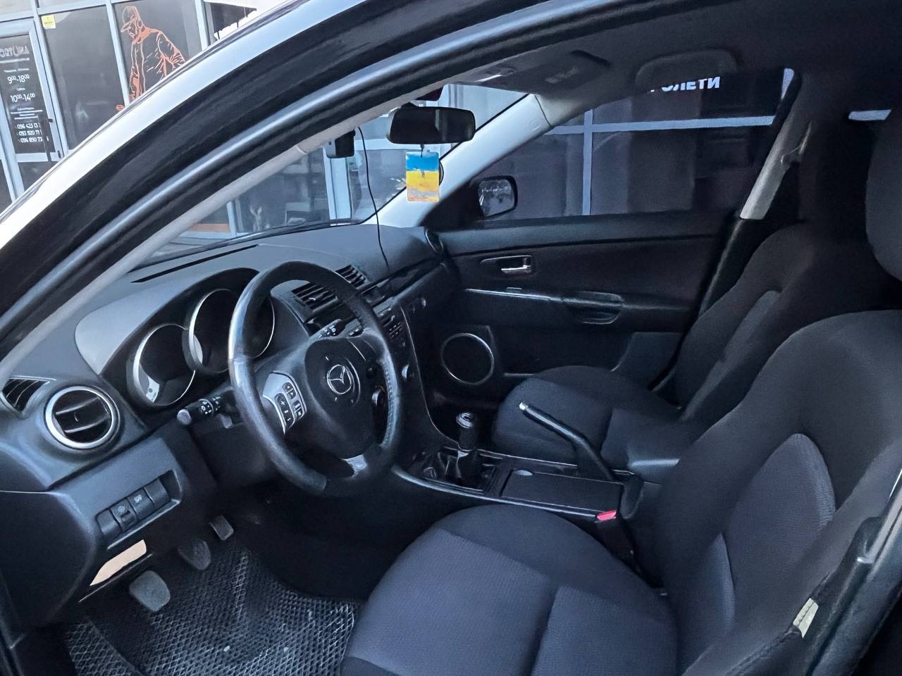 Mazda 3 - фото 5