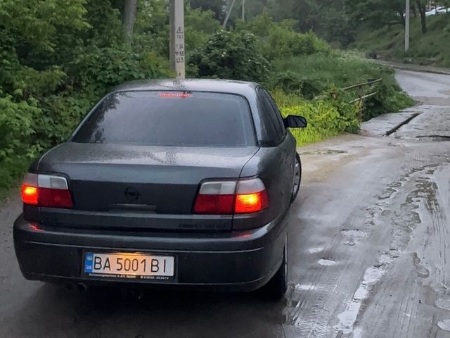 Opel Omega - фото 4