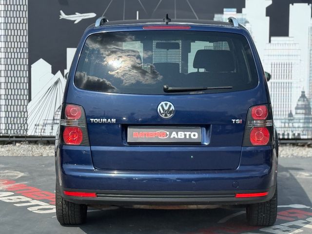 Volkswagen Touran - фото 2