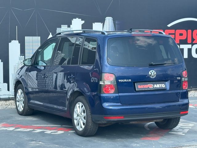 Volkswagen Touran - фото 3