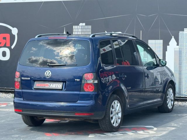 Volkswagen Touran - фото 5