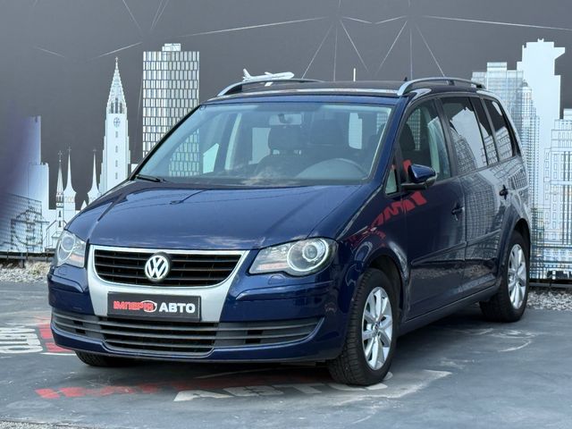 Volkswagen Touran - фото 4
