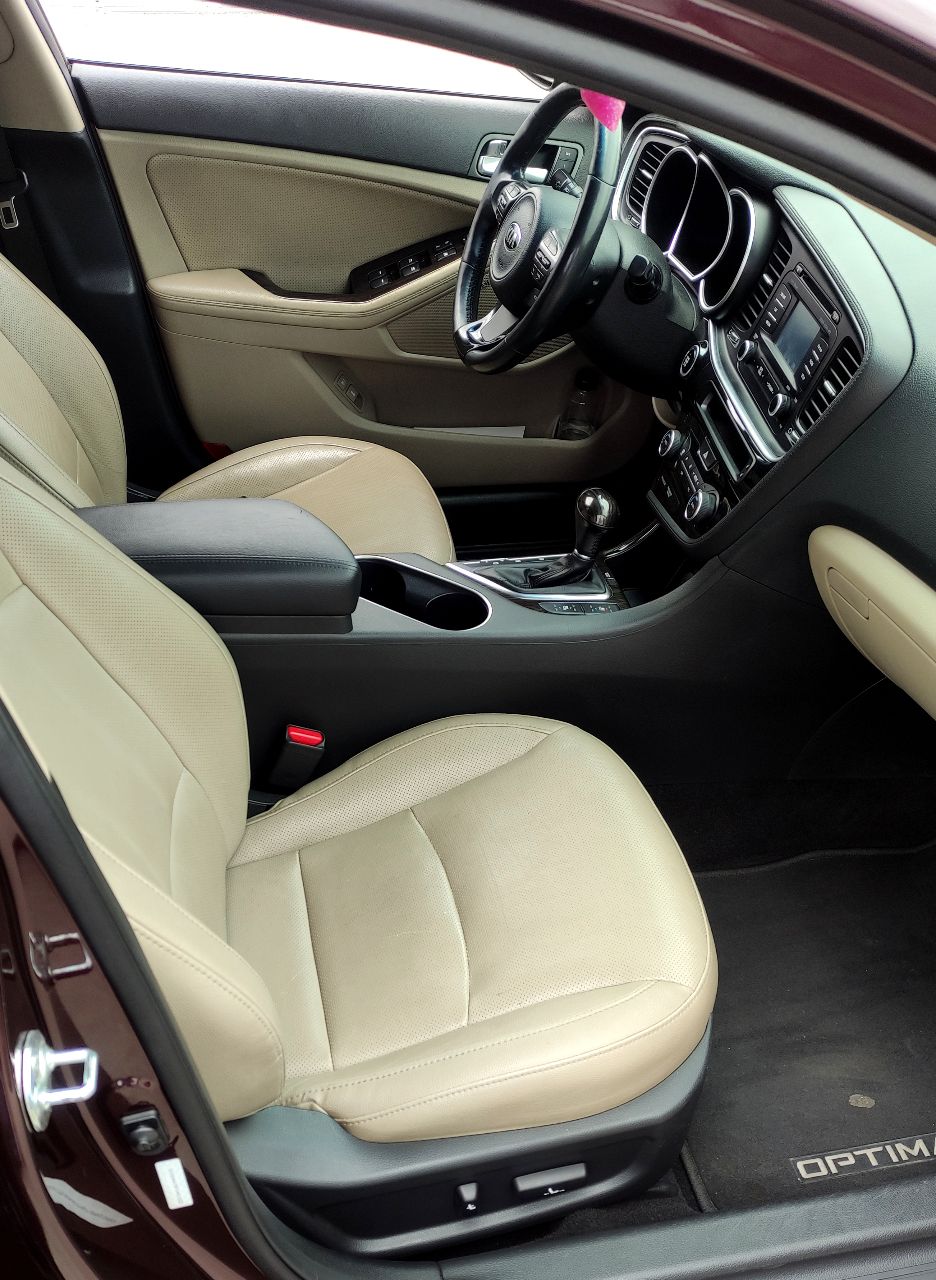 Kia Optima - фото 9