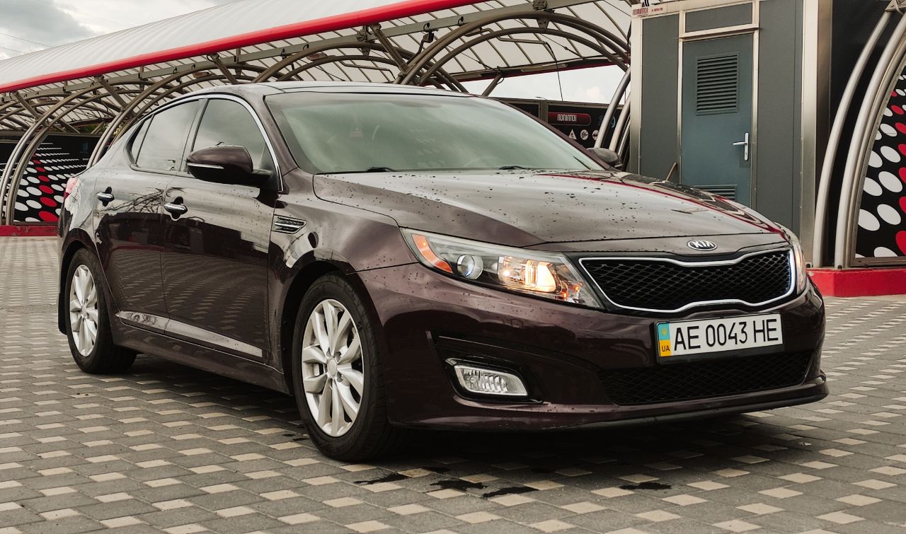 Kia Optima - фото 4