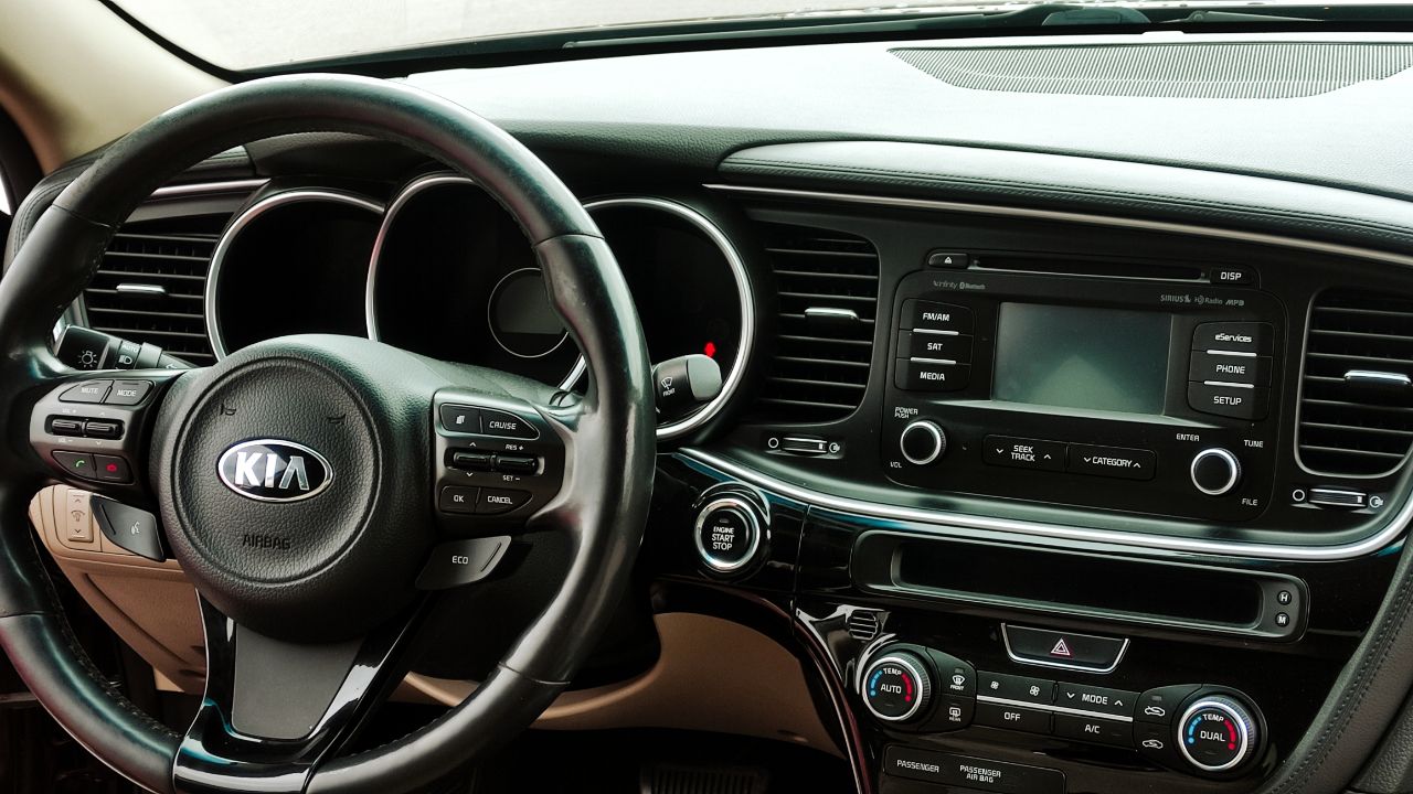 Kia Optima - фото 5