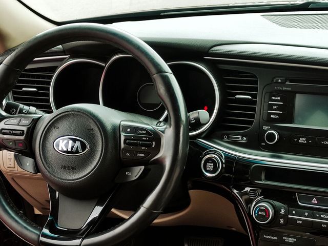 Kia Optima - фото 5