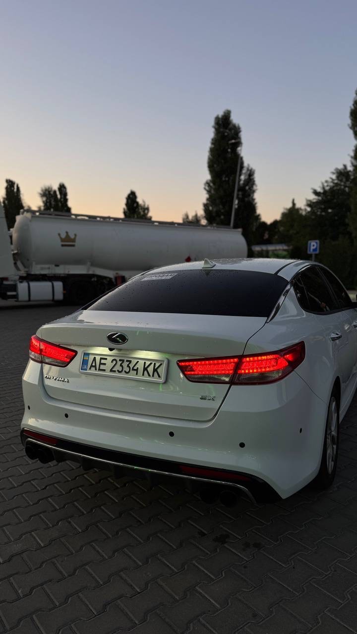 Kia Optima - фото 7