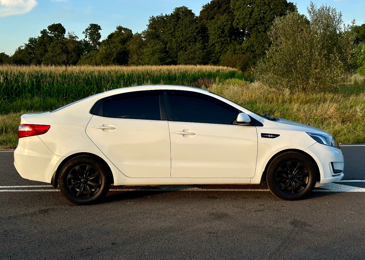 Kia Rio - фото 19