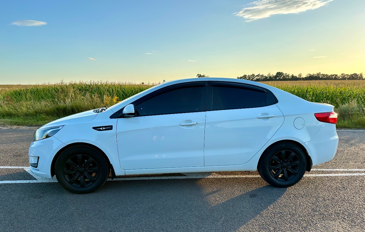 Kia Rio - фото 10