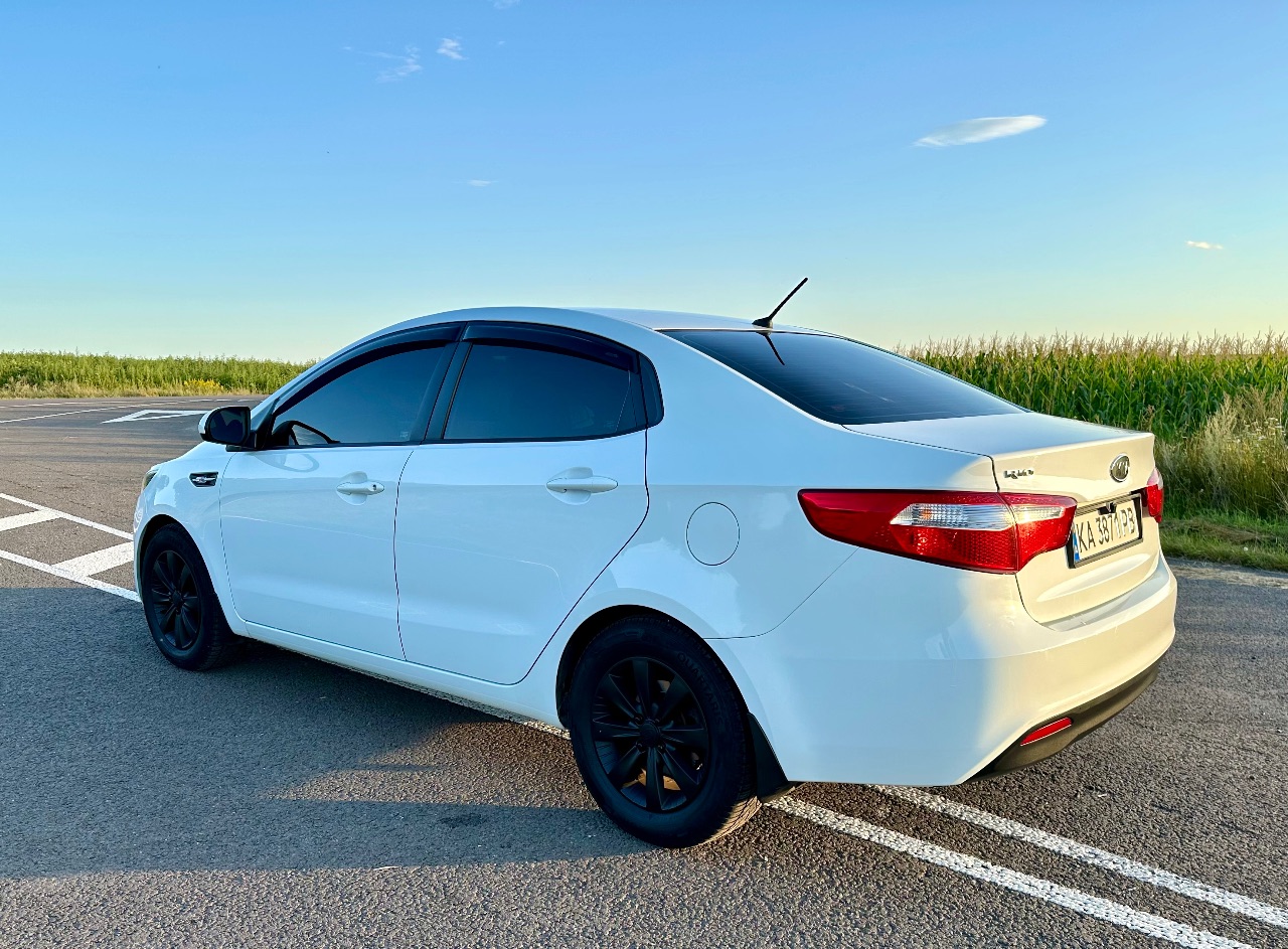 Kia Rio - фото 12