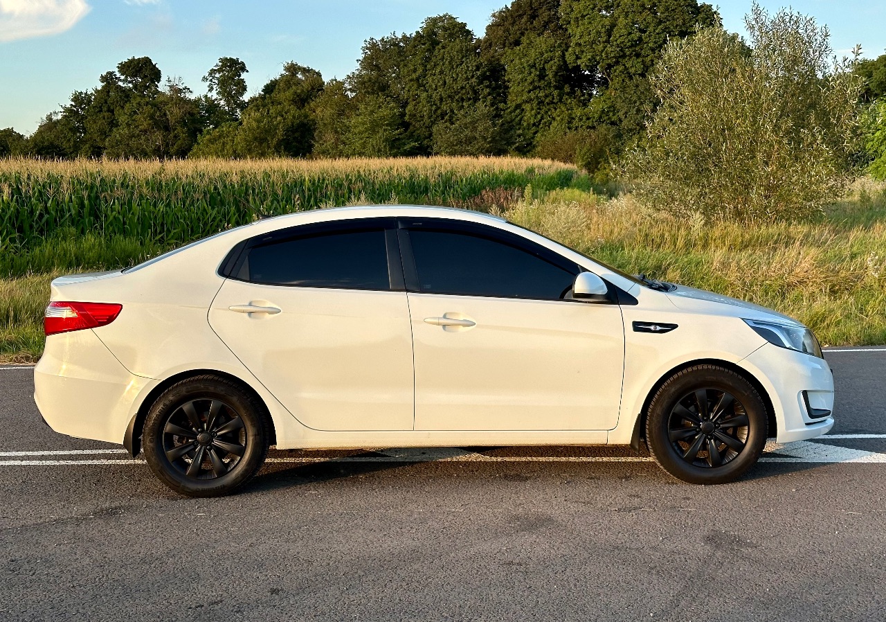 Kia Rio - фото 18